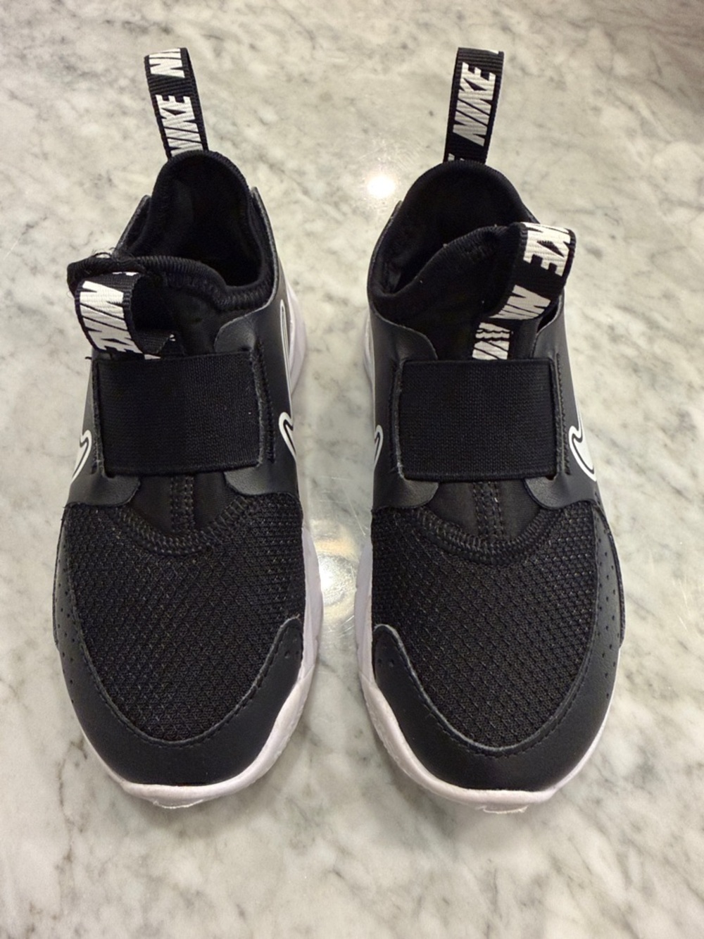 Nike Kids Black and White Slip-On Sneakers